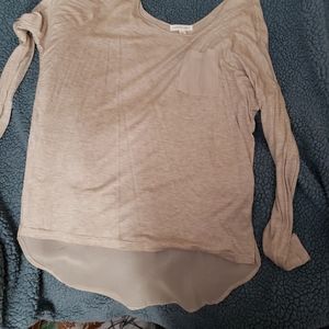 Sheer top with sheer pocket